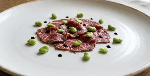 Carpaccio con fave e aceto balsamico