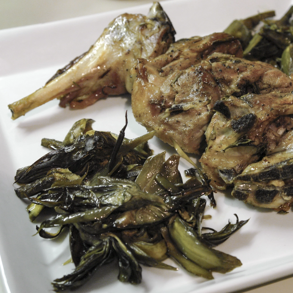Cosca d'agnello al forno con carciofi