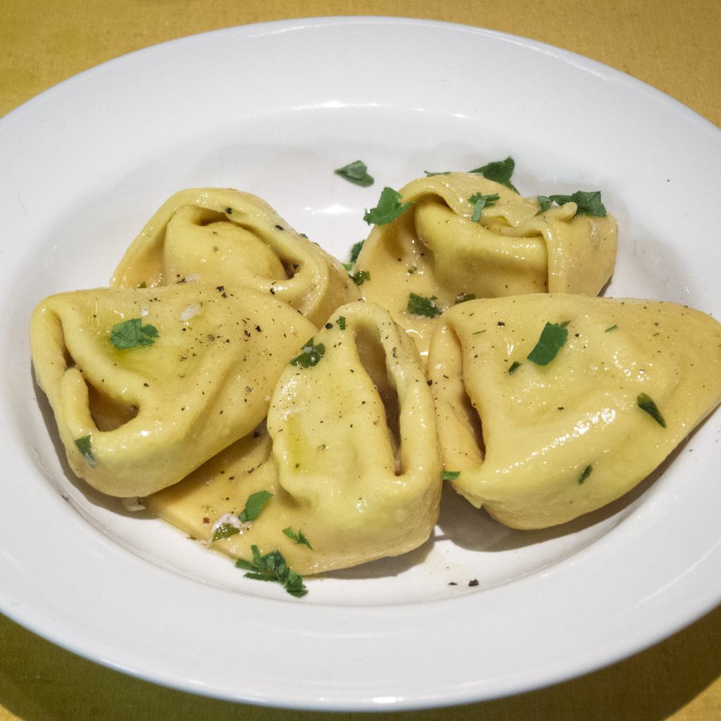 Tortelloni di branzino e guanciale