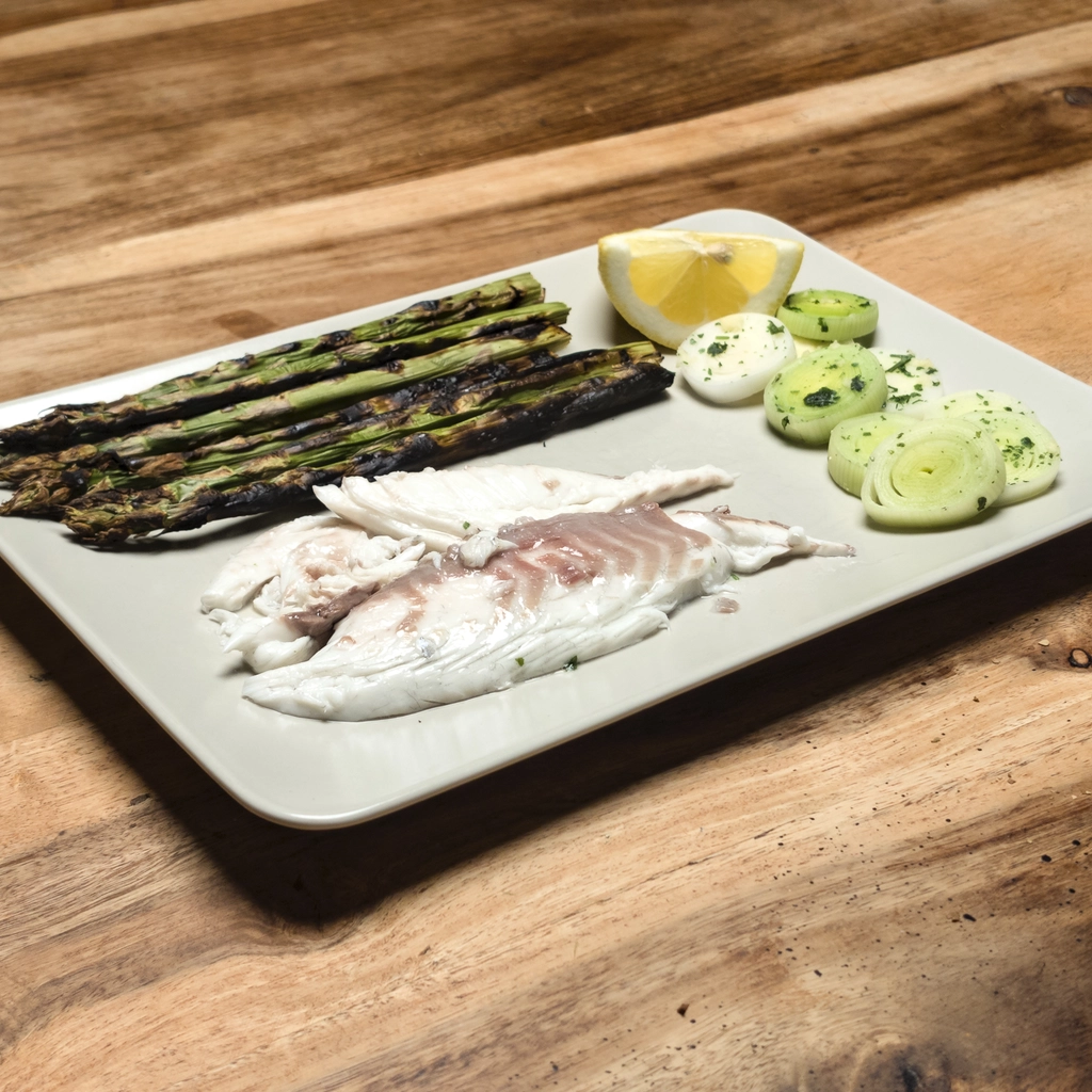 Orata zenzero e porro con asparagi grigliati