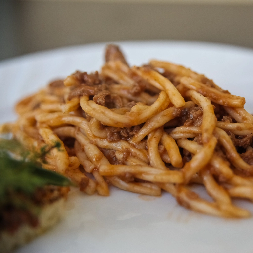Strozzapreti con ragù di Mora Romagnola